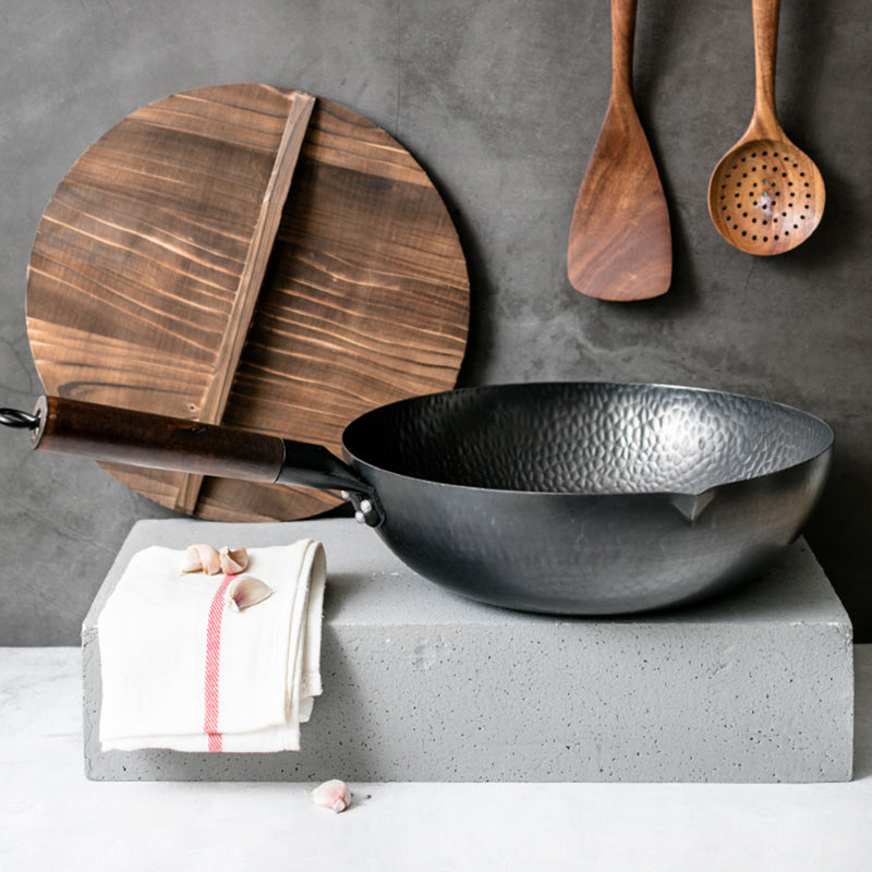 Discover the Magic of Cooking with Our Handmade Traditional Iron Wok Pan